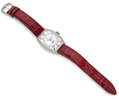 une montre-bracelet pour femme avec un bracelet en cuir d'alligator rouge