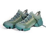 nike air footwear with green and blue colors on a white background