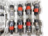 many different types of electronic components in a box