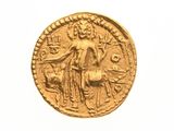 une vieille pièce d'or représentant une femme à cheval