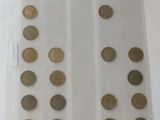 a lot of coins in a plastic bag on the table