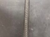 a close up of a metal pipe with a handle on it