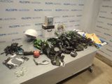a table with a lot of electronics on top of it