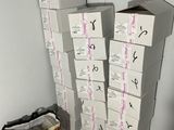 several boxes of food stacked on top of each other in a room