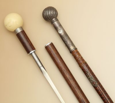 2 CANNES à système - L'une "épée" en bois exotique - Photo 1