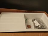 a box that has a sink inside of it