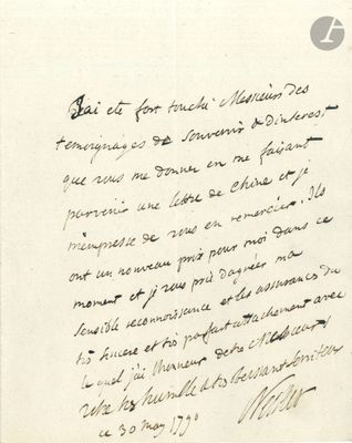 un gros plan d'un morceau de papier sur lequel on a écrit