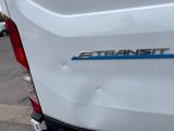 a close up of the rear end of a white truck