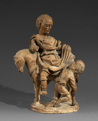 an image of a statue of a man on a horse with a dog