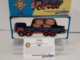 a toy truck that is on display in a box