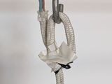 a close up of a piece of electrical wire with wires attached to it