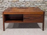 a close up of a coffee table with a shelf on it