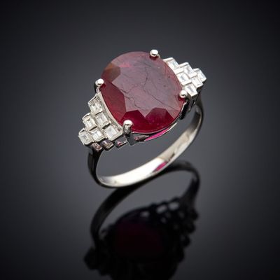 an oval ruby and diamond ring