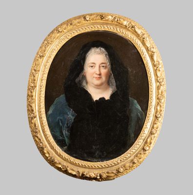 portrait of a woman in a blue dress and a black shawl
