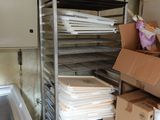 a room with a lot of boxes and boxes on the shelves