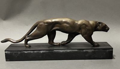 statue of a panther on a marble base on a gray background