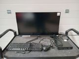 a desk with a keyboard, mouse and monitor on it