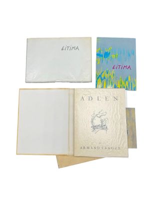 three books sitting on top of each other on top of a white surface