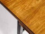 an image of a wooden table with metal legs and a wooden top