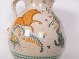 a vase with a picture of a cat on it