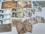 a lot of old paper money on the table