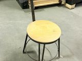 a chair that is sitting in the middle of a room