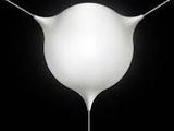 a white lamp that is on a black background