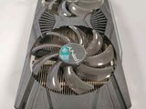 a close up of a video card with a fan on top of it
