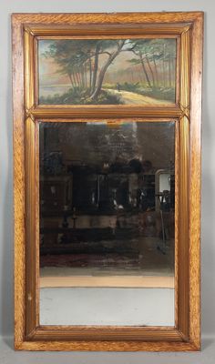 an image of a mirror with a painting of a landscape on it
