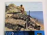a picture of a picture of a man on the beach