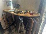 a small table with a lantern on top of it