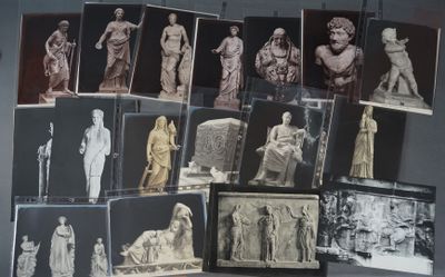 a lot of pictures of statues on display together