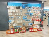 a large display of electronic devices in a store