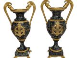 pair of antique black and gold vases with handles on stands