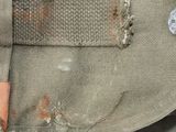 a close up of a bag with a metal object in it