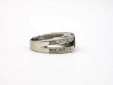 an image of a wedding ring with diamonds on it