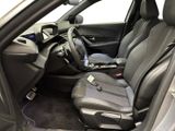 the interior of a car with a steering wheel and seat covers