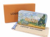 louis vuitton wallet case with a painting of a landscape on it
