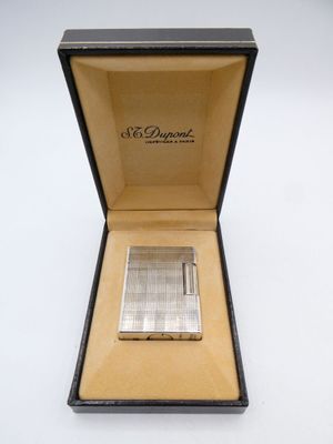 a close up of a box with a lighter inside of it