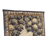 a picture of a tapestry hanging on a wall