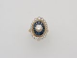 a sapphire and diamond cluster ring