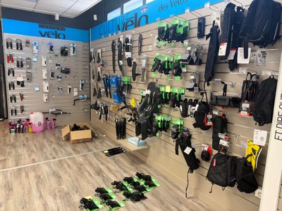 a wall of scuba gear on display in a store