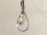 sterling silver pendant with a pearl bead and a chain