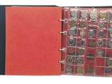 an open book with a bunch of coins inside of it