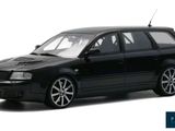 the black car is parked in front of a white background