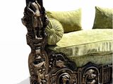 une photo d'un lit très ouvragé recouvert d'un couvre-lit vert