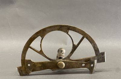 a small metal object that is sitting on a table