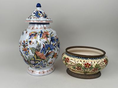 two vases that are next to each other on a table