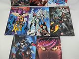 the x - men comic books are lined up on a table
