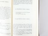 an open book that is sitting on a table
